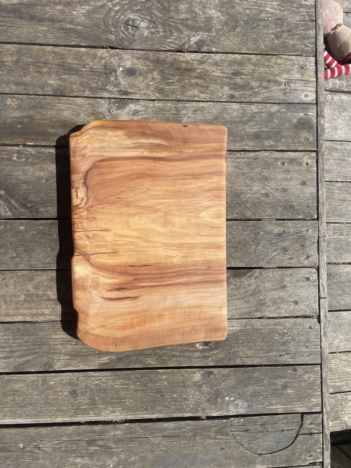 Handmade solid applewood chopping board with rich grain patterns and a thick, durable profile, crafted in Ipswich, Suffolk.